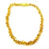 Collier enfant en ambre baroque miel