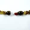 Collier enfant en ambre vert – Image 2